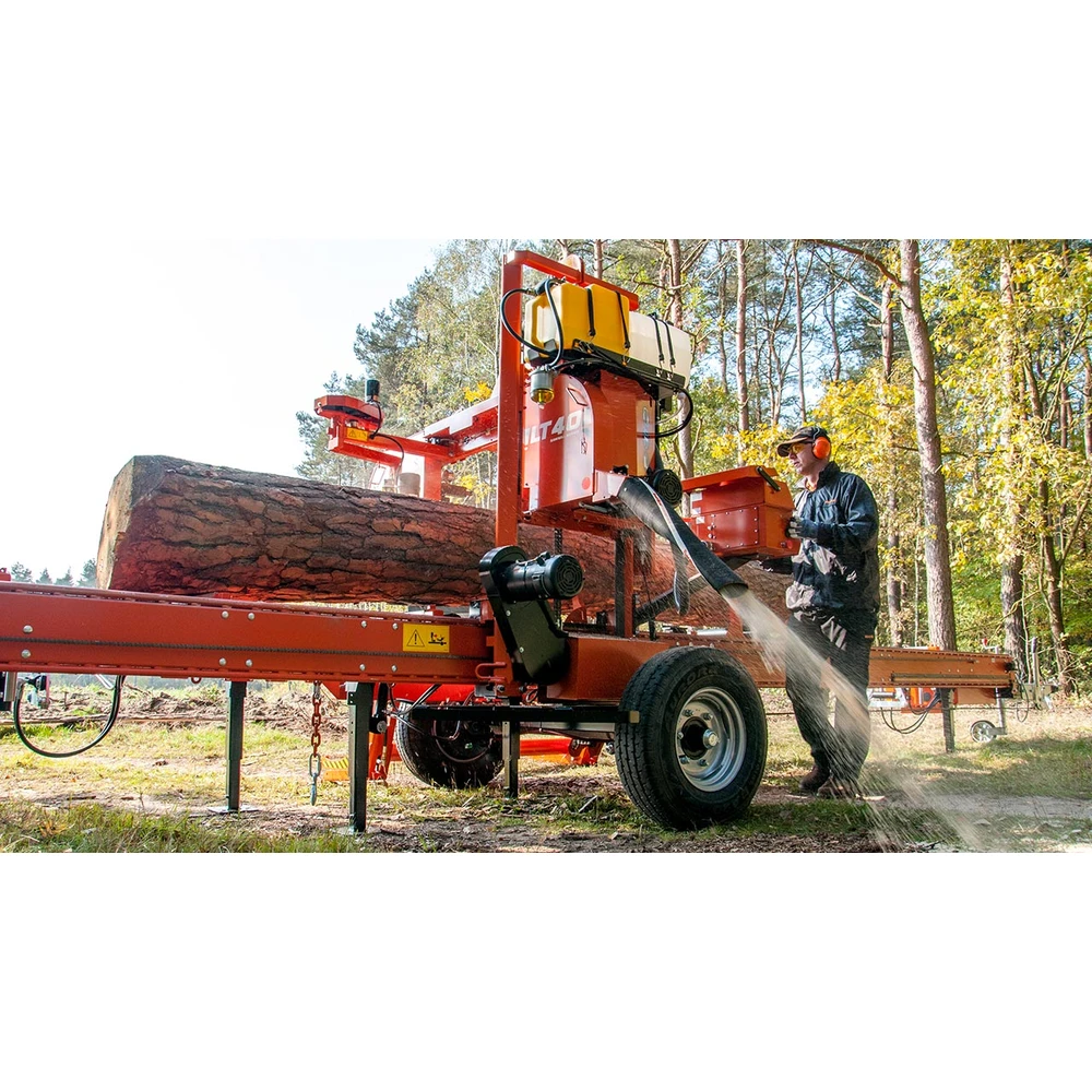Operator cutting a log on the Wood-Mizer LT40 mobile sawmill