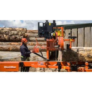 Operator at the Wood-Mizer LT40 Super Hydraulic sawmill in a timber yard