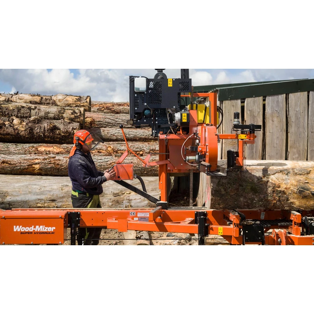 Operator at the Wood-Mizer LT40 Super Hydraulic sawmill in a timber yard