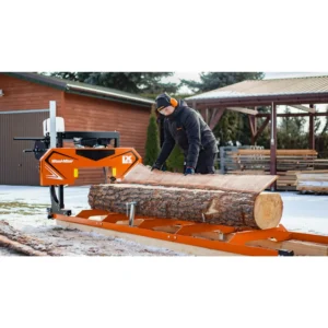 Operator turning a log on the Wood-Mizer LX30 sawmill